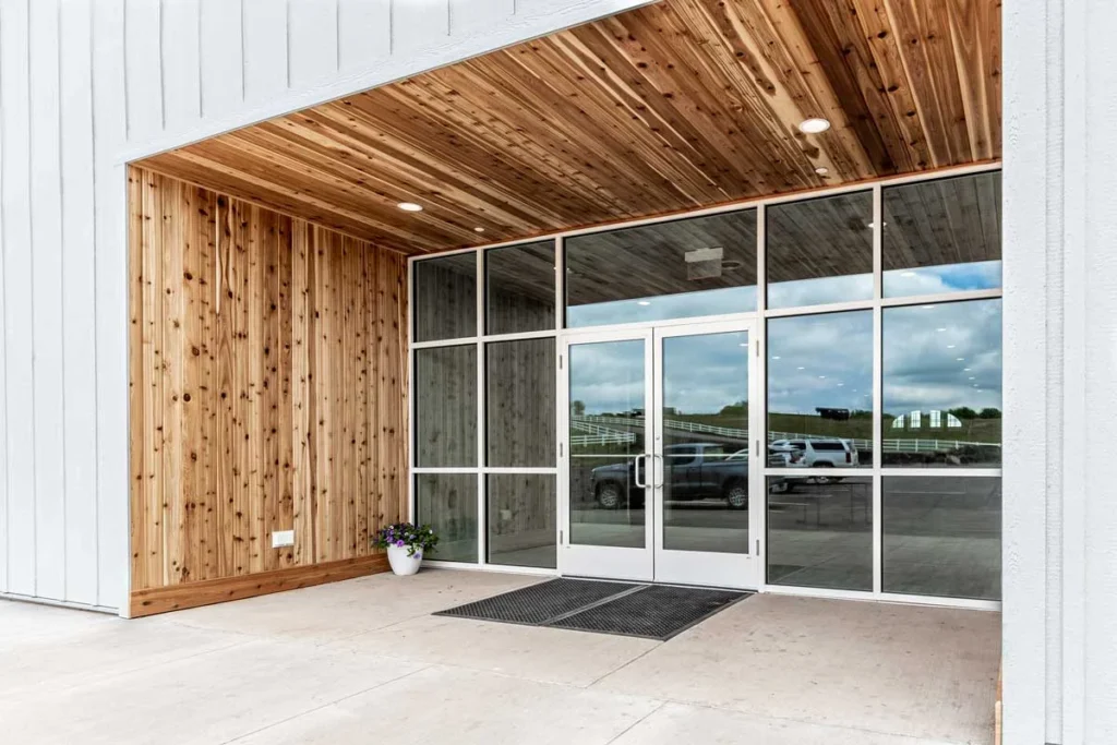 Commercial door and wood plank exterior installation